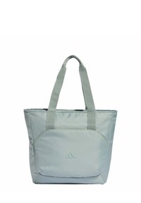Bolsa tote verde claro hecha de tela lisa, con dos asas resistentes, un bolsillo frontal con cremallera y un logotipo de la marca en el exterior.