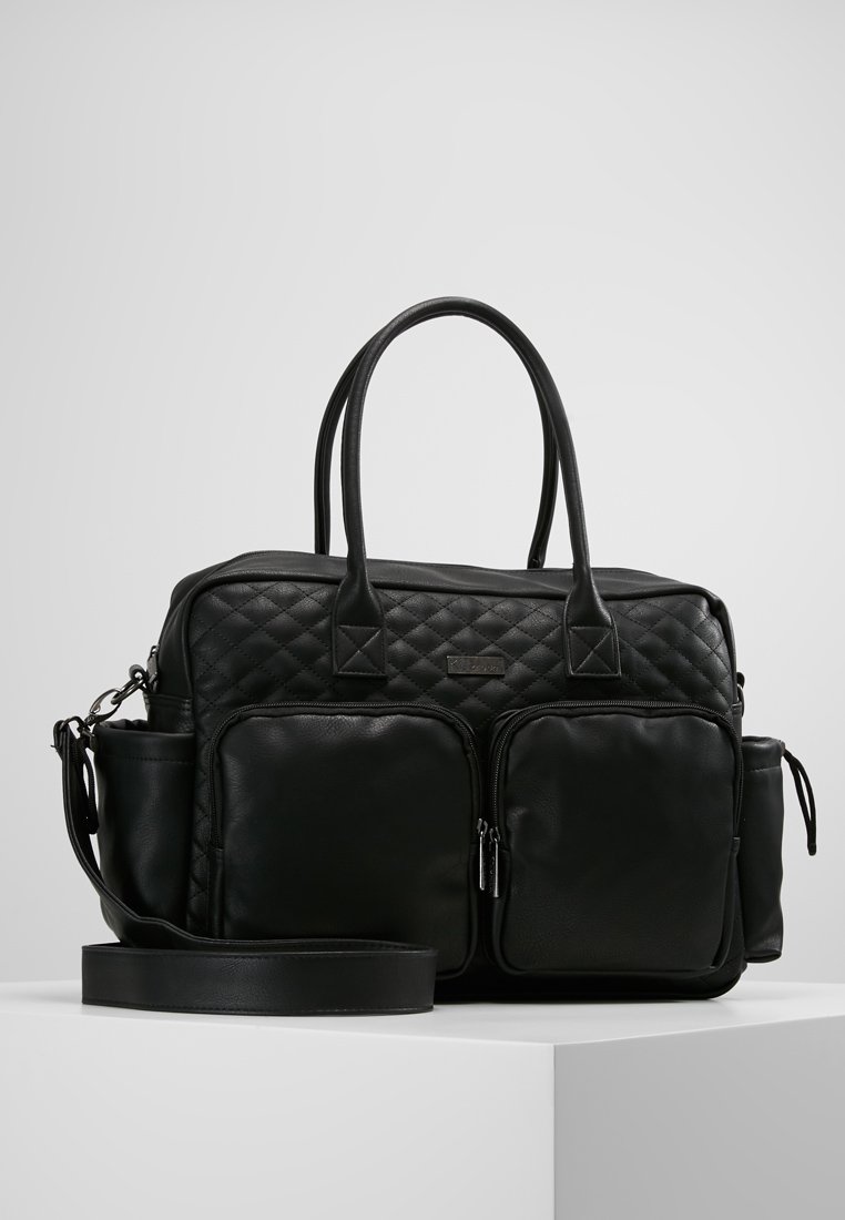 Black quilted fabric handbag with dual rolled handles, two front zippered pockets, and an adjustable shoulder strap. Features a sleek, textured finish.