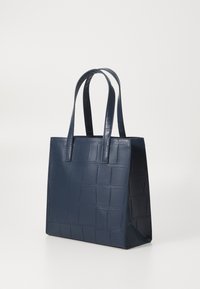 Borsa a spalla blu navy con motivo a stampa coccodrillo, finitura lucida e due manici robusti. Forma rettangolare con base piatta.