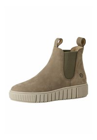 Bottines en daim beige avec panneaux élastiques sur les côtés, languettes de tirage et semelle en caoutchouc texturé crème. Bout rond et design minimaliste.