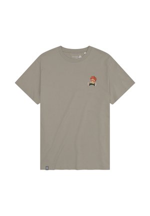 Light brown short-sleeve crew neck t-shirt with a small cartoon character with red hair and green clothing on the left chest.