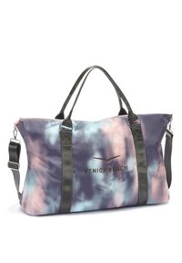 Large duffel bag in tie-dye fabric featuring shades of purple, pink, and blue. Equipped with dual handles and an adjustable shoulder strap.