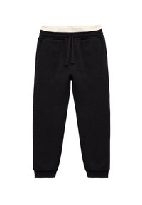 Zwarte joggingsbroek van een gestructureerde stof, met een witte trekceintuur bij de taille en elastische boorden; bevat zijzakken.