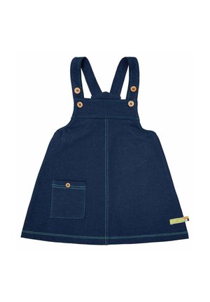 Abito salopette in denim navy con spalline regolabili, dettagli in legno per i bottoni, tasca frontale e cuciture verdi a contrasto.