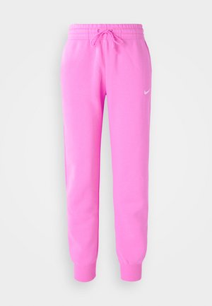 Rozā sporta bikses ar elastīgu jostu, auklu un elastīgām piedurknēm. Priekšpusē ir neliels balts Nike logo. Mīksts audums.