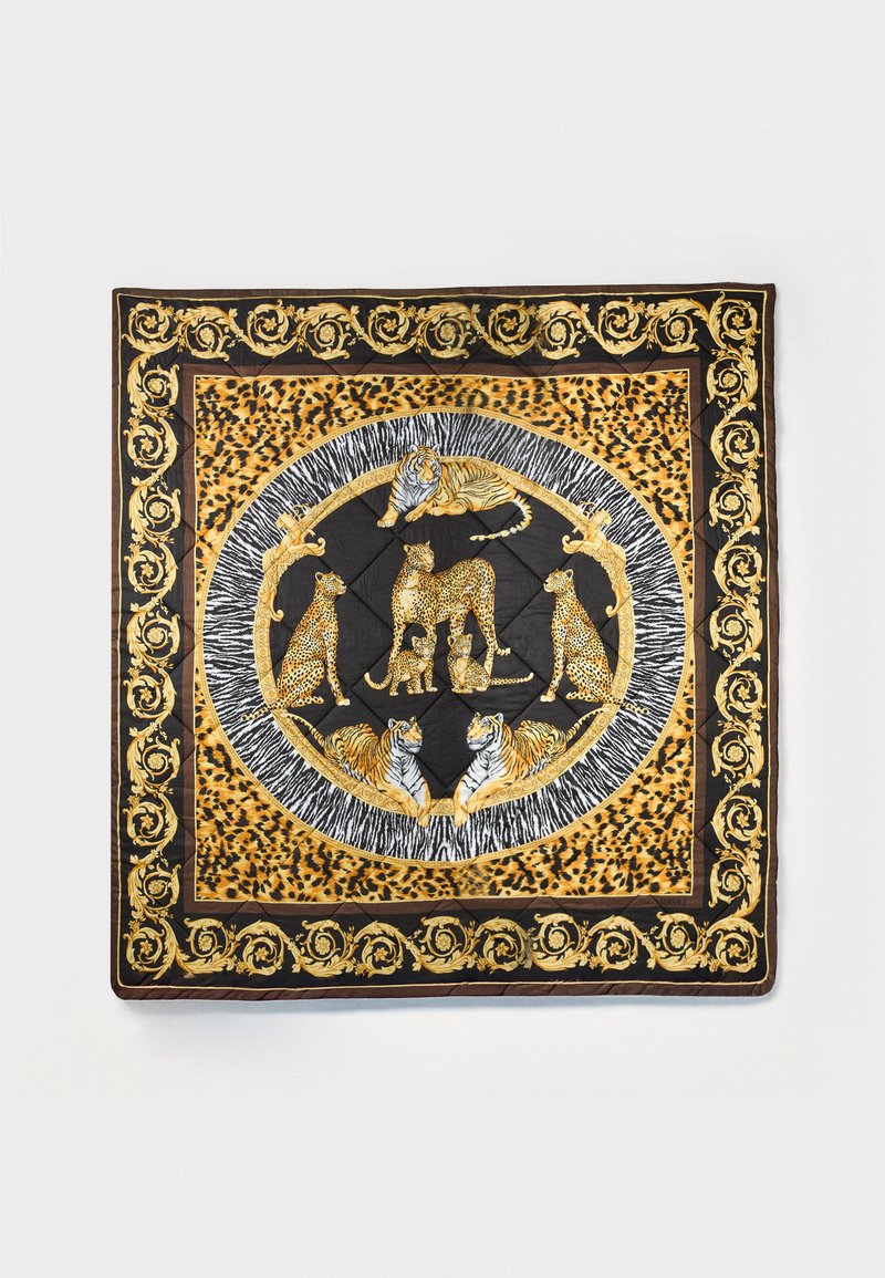 Quilt featuring a black background with golden and leopard print accents. Central design includes stylized animals: tigers and leopards.