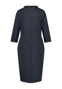Robe bleu marine texturée longueur genou avec manches 3/4 et couture droite dans le dos, vue de dos sur fond blanc.
