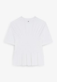 White short-sleeve top with a smocked back, flared hem, and round neckline. Features a small button detail at the top back. Soft fabric texture.