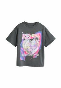 Dark gray t-shirt with a holographic disco ball heart graphic and pastel "Disco Era" text, featuring neon pink and blue abstract background.