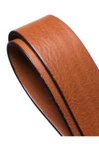 Tan leather strap with a textured surface and black edging. The strap is coiled, showcasing its flexibility and smooth finish.