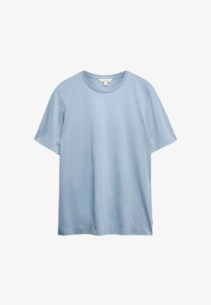 T-shirt en coton bleu clair à manches courtes avec un col rond, design uni et une petite étiquette à l'intérieur du col.