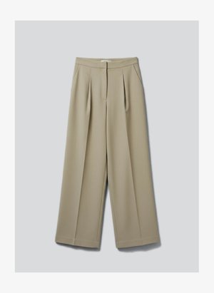 Beežid laia säärega püksid ees volditud detailide, küljetaskute ja peidetud eesmise kinnitusega, esitatud neutraalsel taustal.