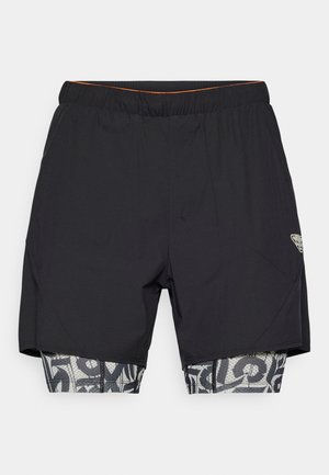 Schwarze Sportshorts mit einem elastischen Bund, ausgestattet mit einer gemusterten Innenschicht in Grau und Schwarz. Das Außenmaterial hat eine strukturierte Oberfläche.