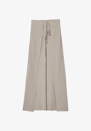 Pantaloni beige a gamba larga realizzati in tessuto morbido, con una vita annodata e spacco laterale, che consentono un movimento fluido e comfort.