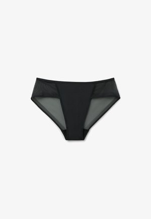 Ropa interior femenina estilo bikini negra con panel frontal sólido y paneles laterales de malla transparente, mostrada sobre un fondo blanco.
