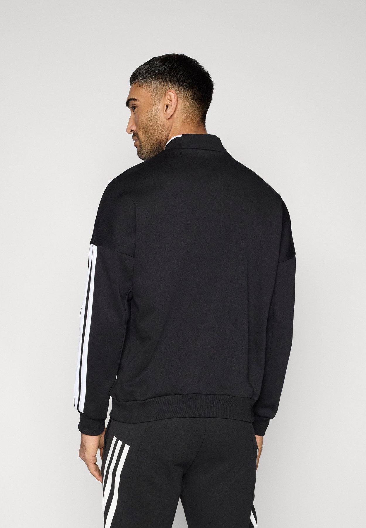 HOUSE OF TIRO HALF ZIP