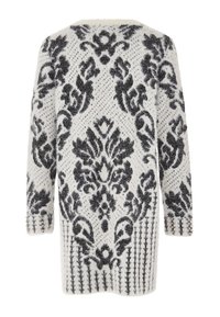 Cardigan lungo bianco con motivo floreale e a righe nere, tessuto testurizzato e bottoni decorativi sulle maniche.