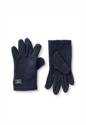 Guanti in pile blu navy con cinque dita e un pollice, dotati di un'etichetta sul polso. Texture morbida e cuciture lisce.