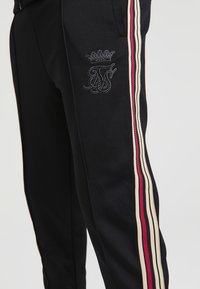 SIKSILK Pantalones deportivos - black