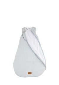 Hellgrauer Babyschlafsack in runder Form, ausgestattet mit einem seitlichen Reißverschluss, weichem Stoff und einem kleinen Logo-Patch am Boden.