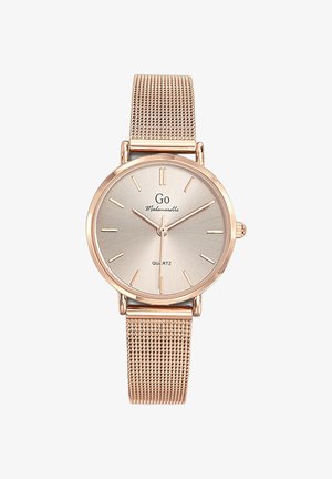 Montre à quartz avec un bracelet en maille dorée rose, cadran rond argenté avec des marqueurs d'heure minimalistes et la marque "Go Mademoiselle".
