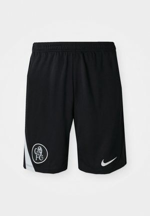 Pantalones cortos deportivos negros, hechos de una tela ligera, con una cinturilla elástica, aberturas laterales y un logo blanco de Nike con un emblema de club.