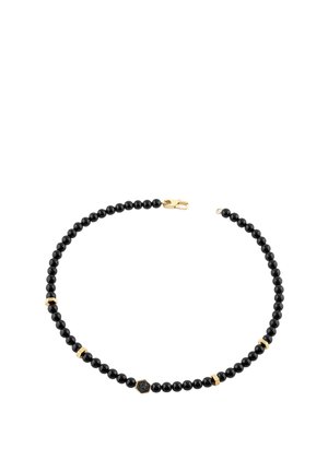 Czarny naszyjnik z koralików z małymi złotymi przekładkami i złotym zapięciem, z centralnym czarnym sześciokątnym koralikiem o fakturowanej powierzchni.
