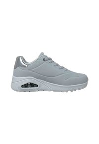 Gray sneaker with a smooth synthetic upper, lace-up design, silver accent on the heel, and visible air cushioning in the sole.
