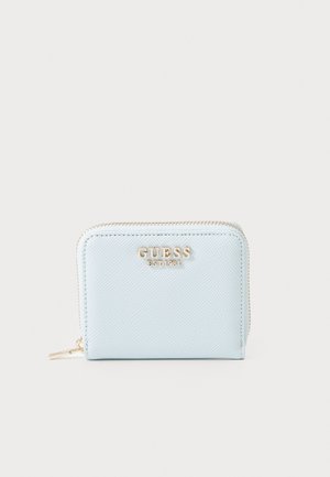Light blue zippered wallet made of textured synthetic material, featuring gold-toned logo and hardware accents on the front.