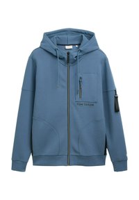 Niebieska bluza z zamkiem wykonaną z miękkiego materiału, z przednią kieszenią, kieszeniami bocznymi oraz kontrastującymi czarnymi szczegółami zamka. Nazwa marki nadrukowana na klatce piersiowej.