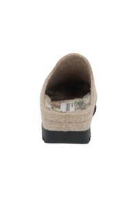 Beige wool slipper with a soft, textured upper, molded black rubber sole, and cushioned interior for comfort. No visible hardware or patterns.