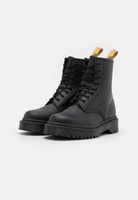Dr. Martens Botines con plataforma - black