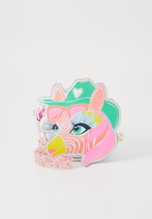 Zebra-shaped crossbody bag features vibrant pink, green, and yellow colors with glossy accents, a chain strap, and illustrated facial details.