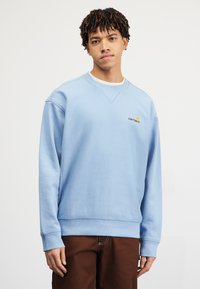 Carhartt WIP AMERICAN SCRIPT - Mikina - frosted blue