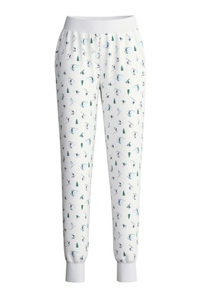White sweatpants with a seasonal ski-themed pattern, featuring skiers and pine trees, elastic waistband, and ribbed cuffs.