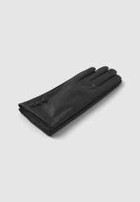 Czarne skórzane rękawiczki z trzema dopasowanymi czarnymi guzikami w okolicy nadgarstka, ułożone na jasnoszarym podłożu.