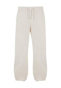 Pantalon de survêtement en coton blanc cassé avec taille élastique et cordon de serrage, coupe décontractée et chevilles resserrées.