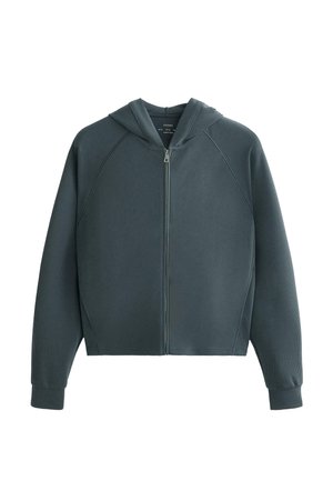Giacca con cappuccio zip-up in verde scuro, caratterizzata da una trama a costine, maniche raglan e polsini elasticizzati. Design minimalista senza hardware visibile.
