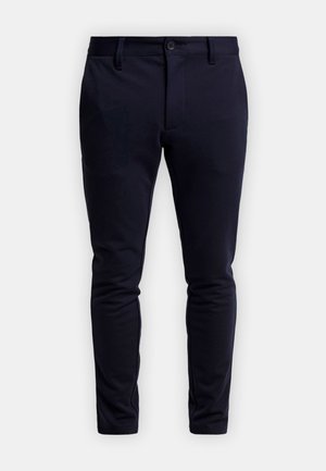 Pantalons slim-fit bleu marine en tissu extensible, avec une fermeture à bouton, des passants de ceinture et sans motifs ni accents visibles.