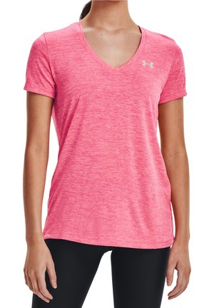 Woman wearing a heathered pink V-neck Under Armour short-sleeve athletic shirt and black leggings, shown from neck to hips.