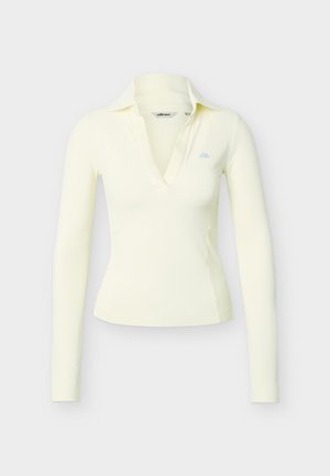 Long-sleeve, cream-colored fitted top with deep V-neck and collar, featuring a small light blue logo on the left chest.