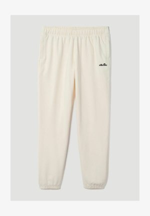 Pantalones jogger color crema con cintura y puños elásticos, con bolsillos laterales y pequeño logo negro de Ellesse en el muslo derecho.