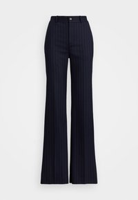 Pantaloni a campana blu navy con strisce bianche verticali, chiusura con bottone e due tasche anteriori, realizzati in un tessuto testurizzato.