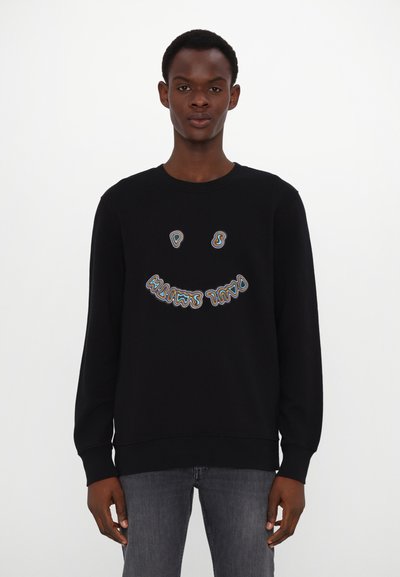 Felpa nera a maniche lunghe con un design di faccina sorridente colorata ricamata sulla parte anteriore. Tessuto morbido e polsini a coste.