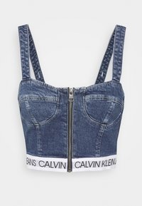 Džínová crop top s nastavovacími ramínky, předním zipem, tvarovanými košíčky a bílým elastickým páskem s brandingem Calvin Klein Jeans.