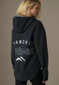 Next OUTDOOR QUARTER ZIP - Kapucni - slate grey apres ski graphic