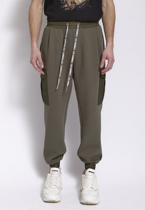 JOGGER - Pantaloni sportivi - green
