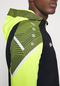 JAKO PERFORMANCE - Trainingsjacke - shwarz/soft yellow