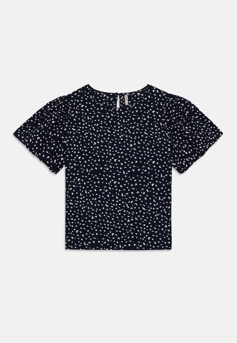Blouse bleu marine, manches courtes à volants, motif à pois blancs éparpillés, col rond, tissu léger, design minimaliste.