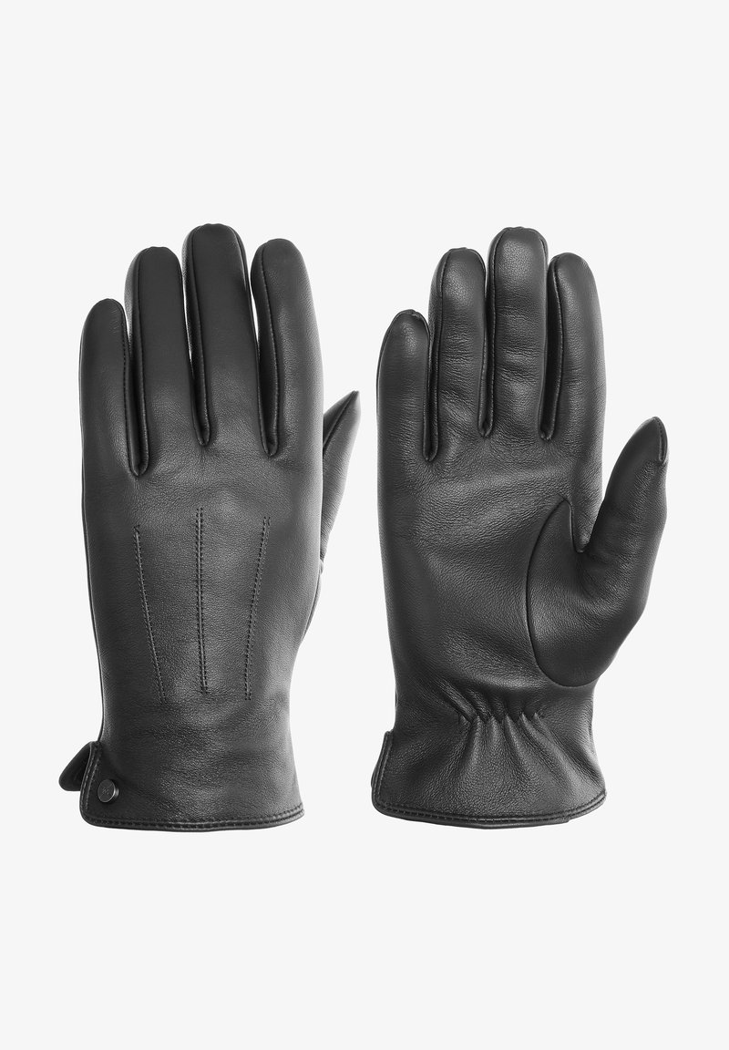 Juodi odiniai pirštinės su lygiu paviršiumi, turinčios tris dekoratyvinius siūlų brūkšnius ant nugaros ir susiraukšlėjusią riešo dalį.